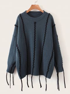 Стильный свитер с бахромой