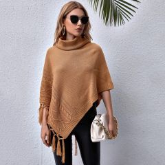 Вязаный свитер-пончо с бахромой