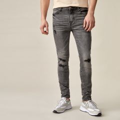 Мужские рваные джинсы с пуговицами