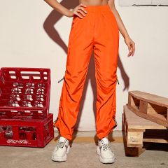 Неоновые оранжевые брюки на кулиске