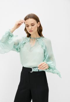 Блузы с рюшами и воланами