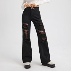 Рваные широкие джинсы с высокой талией
